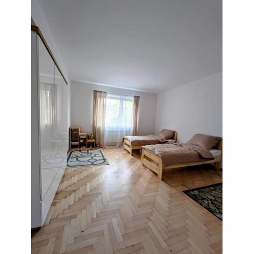 70m mieszkanie w domu jednorodzinnym do 8 osób, darmowy parking, atrakcje dla dzieci, balkon, duży ogród