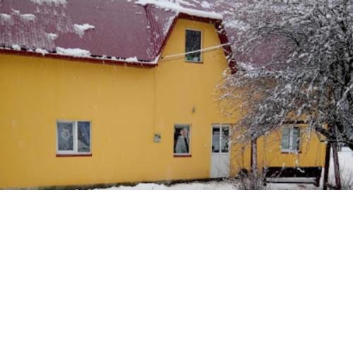 Біля комори