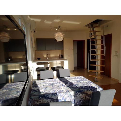 A peaceful two floor apartment with a sea view