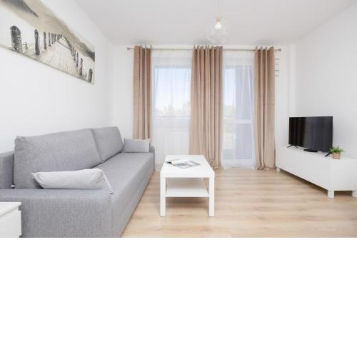 Air Conditioned Apartment in Warsaw with Parking, Desk and Balcony by Noclegi Renters