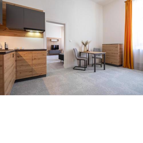 ALURE RESIDENCES 10 - 24h self check-in & private parking next to the apartment building included, CITY CENTER right on SNP Square in a quiet passage, new building, best deal in town