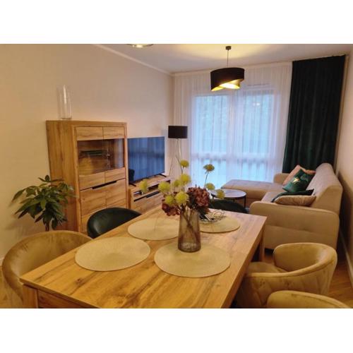 Apartament 55 z miejscem w garażu