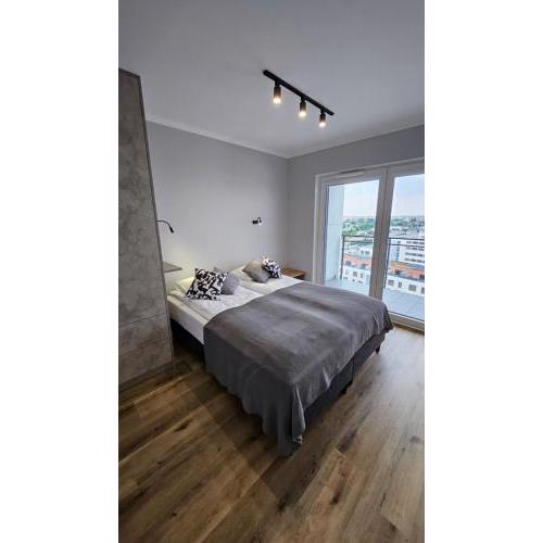 Apartament Bułgarska 59 - sypialnia i salon - 40m2 - self check in 24h