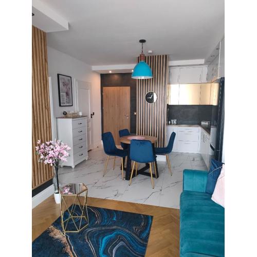 Apartament High Five z kominkiem