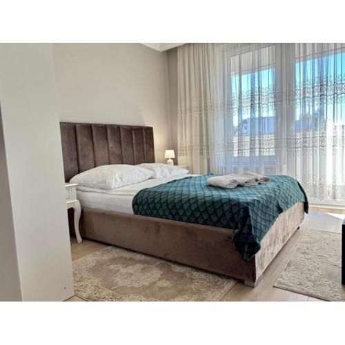 Apartament komfortowy z dwoma sypialniami i balkonem