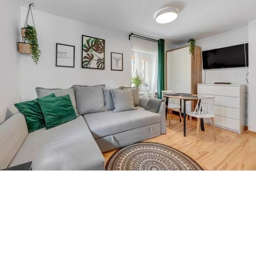 Apartament w Dolnym Sopocie w przyziemiu by Grand Apartments