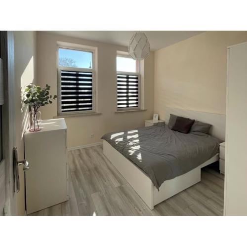 Apartament w Nowym Warpnie z widokiem na wodę.