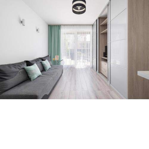Apartament w Spokojnej Okolicy z Parkingiem by Noclegi Renters