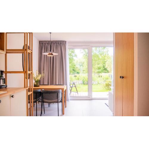 Apartament w willi z sauną i ogrodem SurfingBird Dźwirzyno
