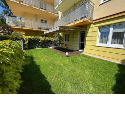 Apartament z garażem i ogrodem