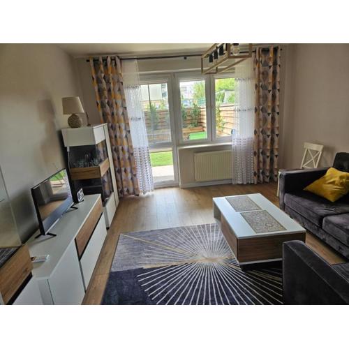 Apartament z ogrodem