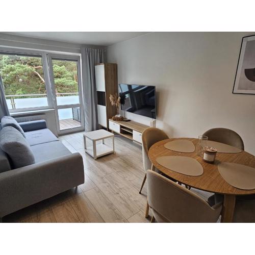 Apartament z widokiem na las