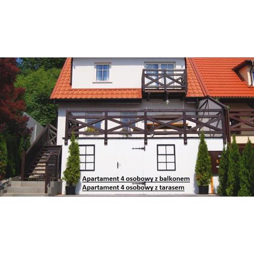 Apartamenty i pokoje Mikołajki