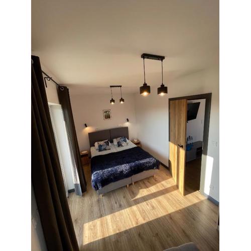 Apartamenty Łuska w Dębinie