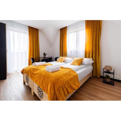 Apartamenty Podtatrzański