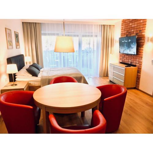 Apartamenty Rodzinne z ogródkiem