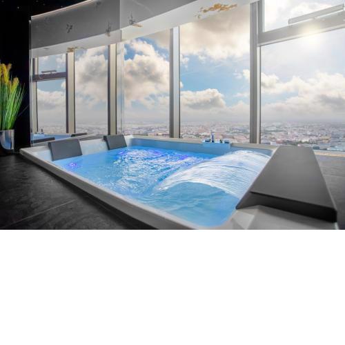 Apartamenty Sky Tower z Jakuzzi Przy Oknie