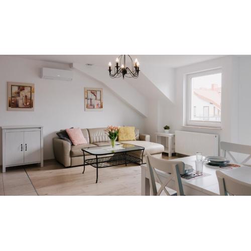 Apartamenty Sun & Snow Baltic Korona blisko portu, plac zabaw
