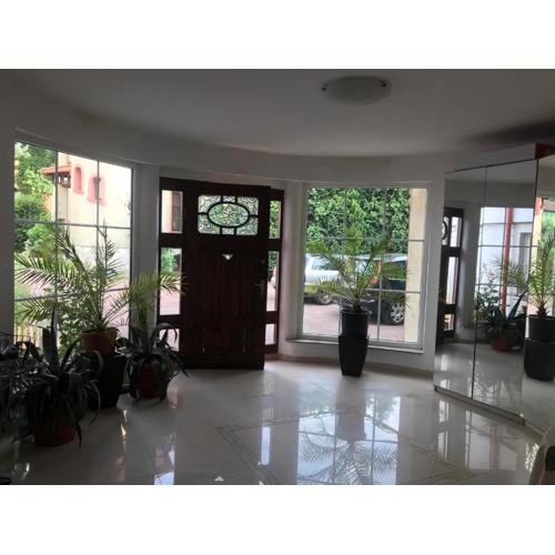 Apartamenty w ogrodzie
