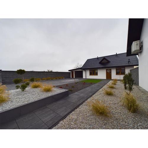 ApartamentySnu, Dom na Przedmieściu