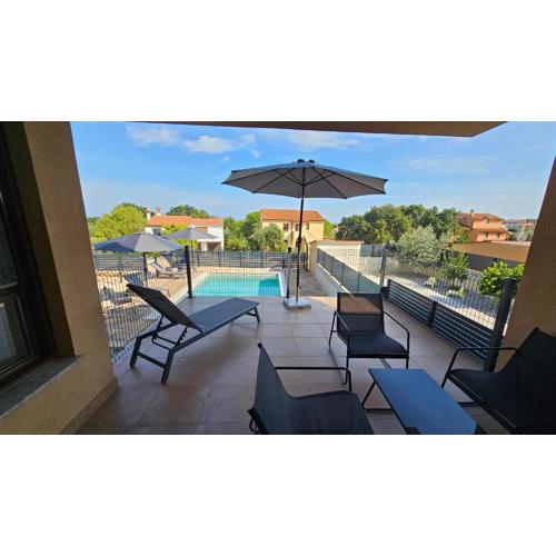 Apartment Bluemare with shared pool