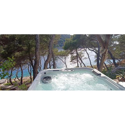 Apartment by the sea Žirje with private heated hydromassage pool