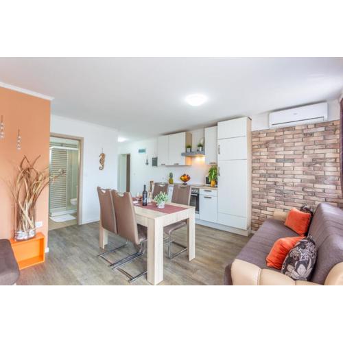 Apartment in Njivice with sea view, balcony, air conditioning, WiFi (4930-1)