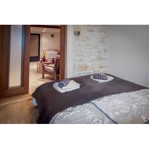 Apartment in stone Villa for two with a shared pool