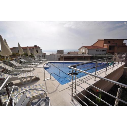 Apartment Joza with pool and sea view, 2 min walk to the beach