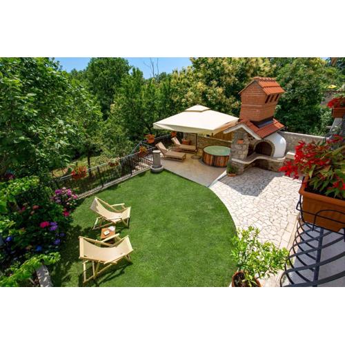 Apartment Laura Ika-Lovran 80 m2 with private 100 m2 garden hot tub free parking