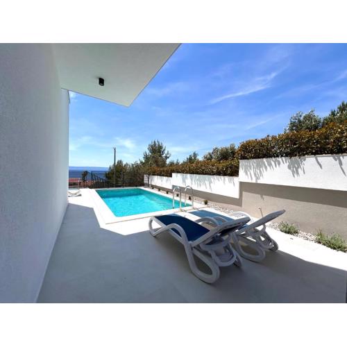 Apartment Petar with pool and sea view