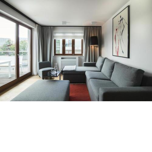 Apartment with Terrace and Sauna by Grand Apartments