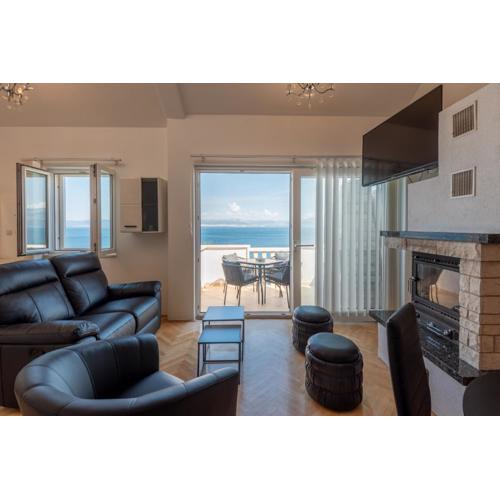 APARTMENTS BRUNO 1&2 - two-room penthouse apartments - wonderful panoramic view of the sea - the best location, first row to the beach - 10 minutes from Supetar ferry port - free secured parking - facilities nearby