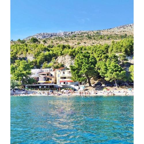 Apartments by the sea Krilo Jesenice, Omis - 23043