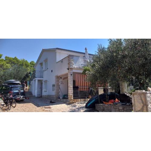 Apartments by the sea Maslinica, Solta - 23173