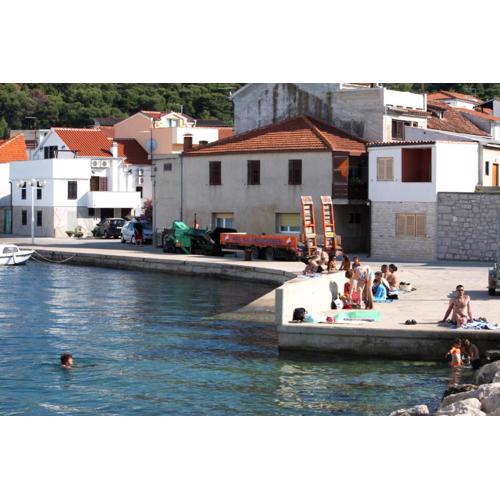 Apartments by the sea Tisno, Murter - 24209