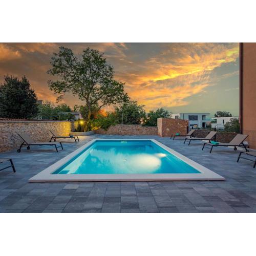 Apartments Cesare with Shared Pool