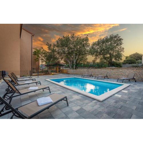 Apartments Cesare with Shared Pool
