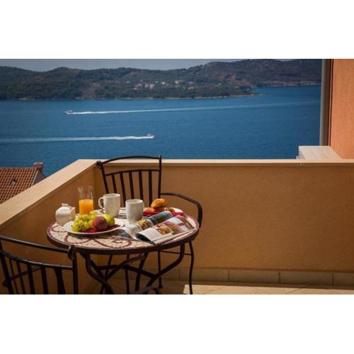 Apartments Nina - Two-Bedroom Apartment with Balcony and Sea View Ora ac
