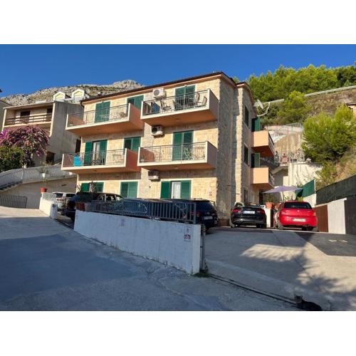 Apartments with a parking space Nemira, Omis - 21891