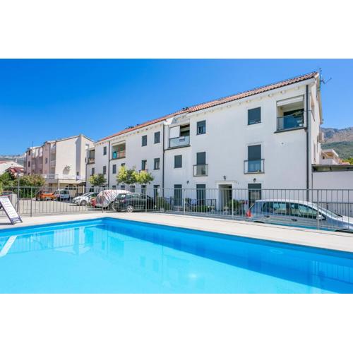 Apartments with a swimming pool Podstrana, Split - 22897