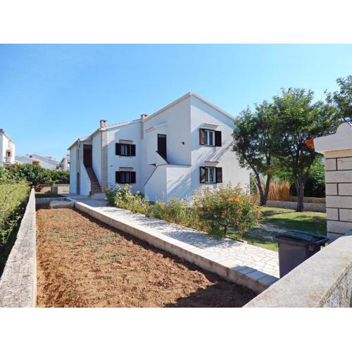 Apartments with parking spaces Pag - 11358