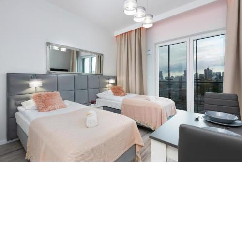 Apartments with parking Warsaw Business Center by Noclegi Renters