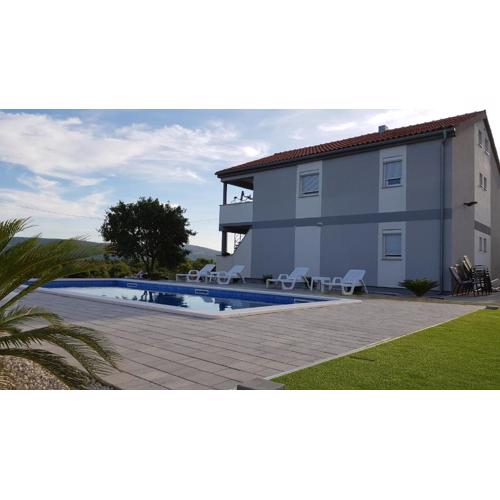 Apartments Zanic with private swimming pool and sea view