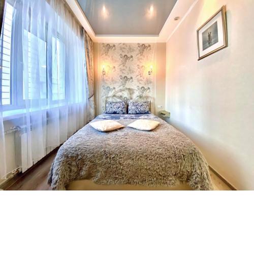 ApartPoltava Елегантна ДВОКІМНАТНА студія з панорамою на театр Гоголя, ЦУМ, Фіскальний ЧЕК