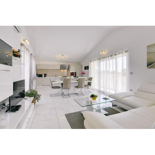 Appartement mit großem Garten und Grillbereich