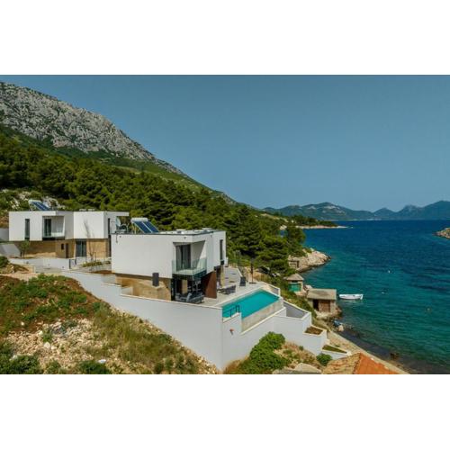 Beachfront villa Luce with seaview and pool