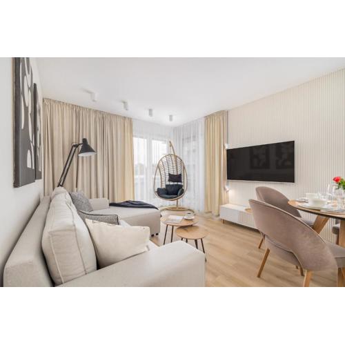 Beautiful Apartment with Balcony and Parking by Noclegi Renters