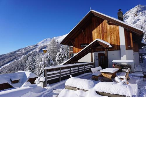 Bergheim Schmidt, Almhütten im Wald Appartments an der Piste Alpine Huts in Forrest Appartments near Slope