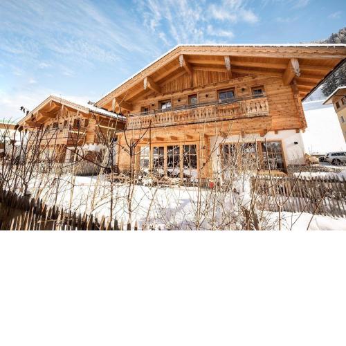 Birnbaum Chalet Kreuzkogel mit Naturbadesee und eingezäunten Garten